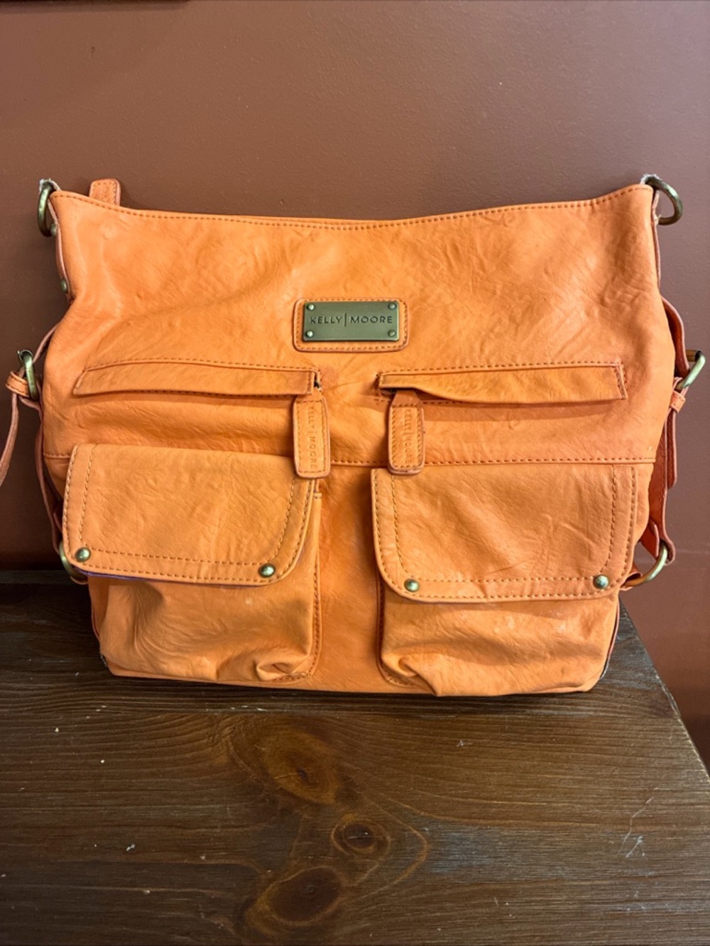 Kelly Moore Orange Faux Leather camera/diaper Bag with Front Pockets